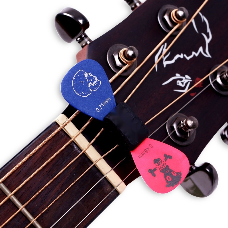 Set de púas de guitarra con soporte de silicona