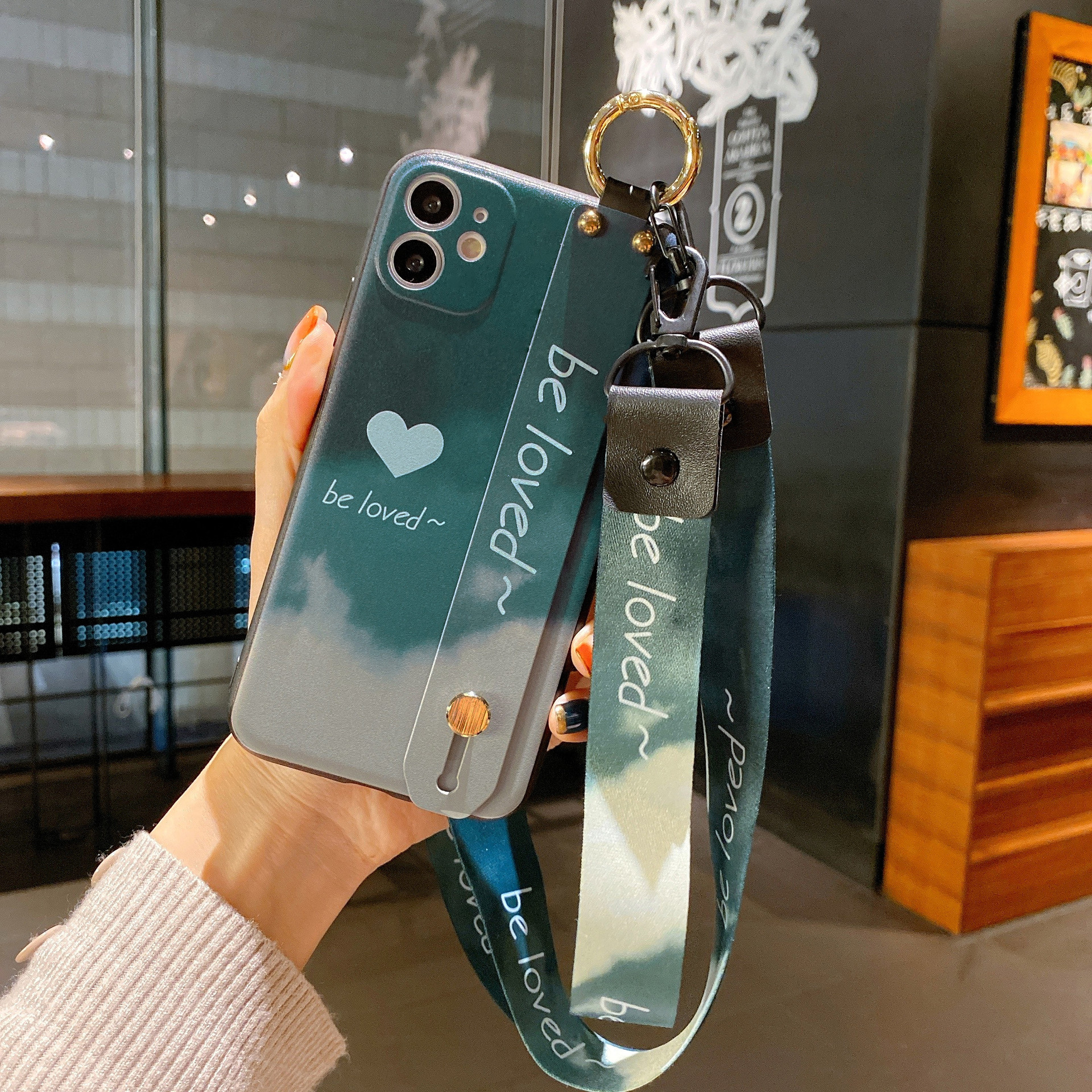 Funda para teléfono con correa de muñeca y diseño acuarela